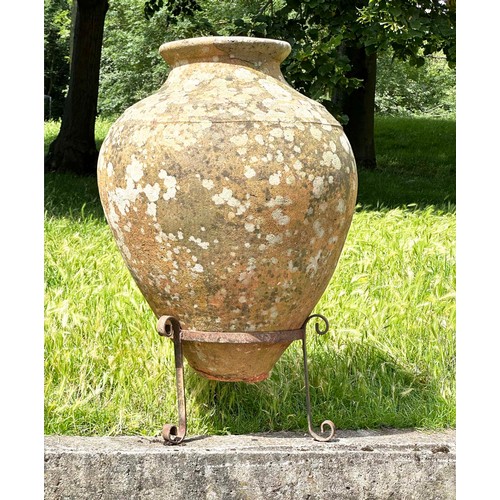 138 - GARDEN URN ON STAND, well weathered terracotta with moulded rim and ridged decoration tapering form ... 