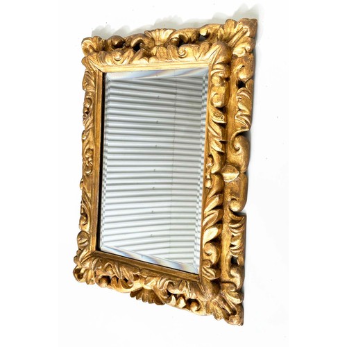 123 - WALL MIRROR, early 19th century Italian giltwood rectangular with carved foliate frame, 58cm W x 73c... 