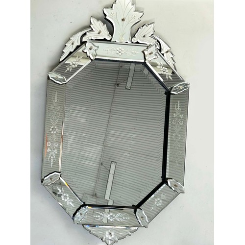 129 - VENETIAN WALL MIRROR, octagonal with etched marginal plates and crest, 98cm H x 54cm W.