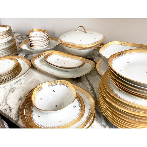 132 - LIMOGES LUNCH SERVICE, French Limoges porcelain Theo Haviland white and gilt borders with sprig deco... 