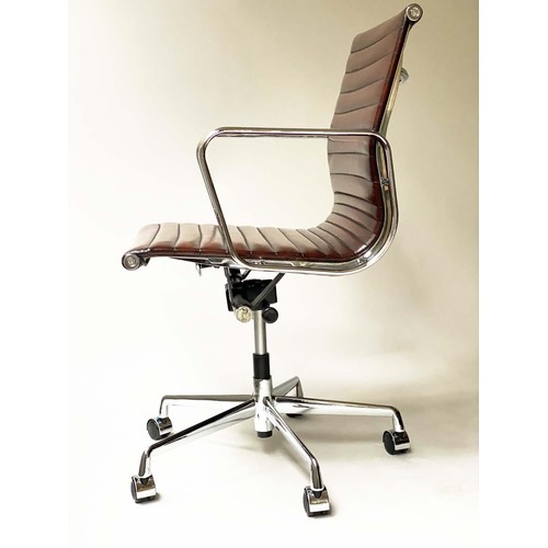 130 - REVOLVING DESK CHAIR, Charles and Ray Eames inspired with ribbed hand finished soft tan brown leathe... 