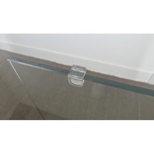 489 - GLASS DINING TABLE, with curved supports, 80cm D x 78cm W x 190 H.