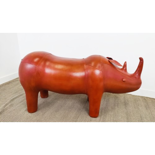 444 - LARGE RHINO FOOTSTOOL, tan leathered, 72cm H x 140cm l x 48cm W.