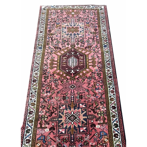 107 - PERSIAN KARAJA RUNNER, 388cm x 80cm.