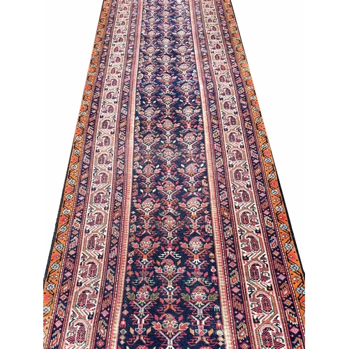 111 - ANTIQUE PERSIAN FEREGHAN LONG RUNNER, 505cm x 98cm.