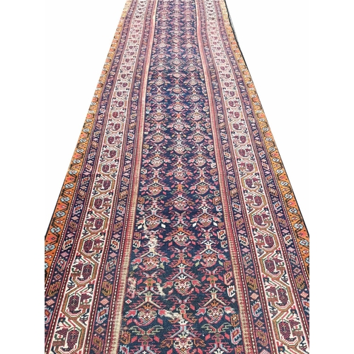 111 - ANTIQUE PERSIAN FEREGHAN LONG RUNNER, 505cm x 98cm.