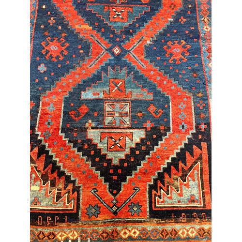 111A - ANTIQUE TURKISH RUG, 228cm x 135cm.