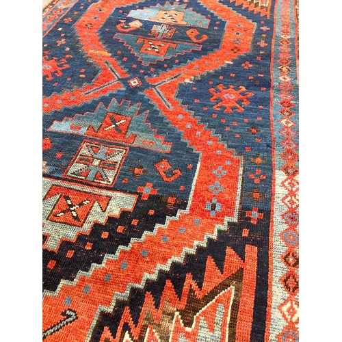 111A - ANTIQUE TURKISH RUG, 228cm x 135cm.