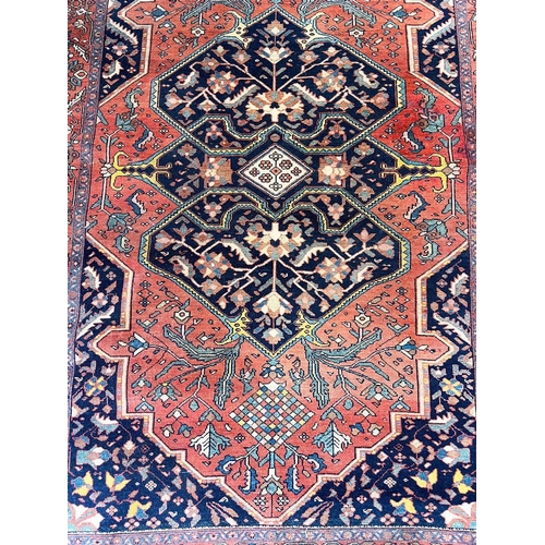 118A - ANTIQUE MALAYER RUG, 188cm x 131cm.