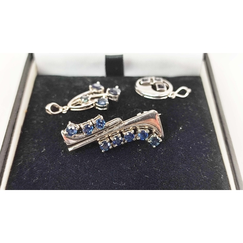 14 - A 9CT WHITE GOLD AND SAPPHIRE SET BROOCH, together with two similar 9ct white gold and sapphire set ... 