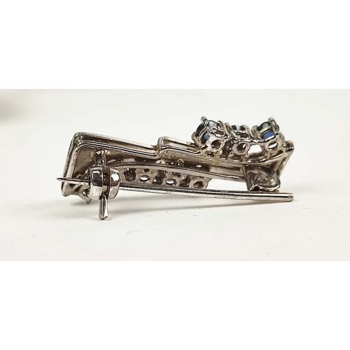 14 - A 9CT WHITE GOLD AND SAPPHIRE SET BROOCH, together with two similar 9ct white gold and sapphire set ... 