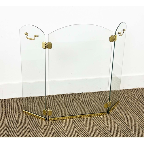 142 - FIRE SCREEN, in the manner of Jacques Adnet (1900-1984), glass and brass, 64cm H x 82cm W.