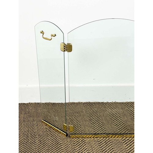 142 - FIRE SCREEN, in the manner of Jacques Adnet (1900-1984), glass and brass, 64cm H x 82cm W.