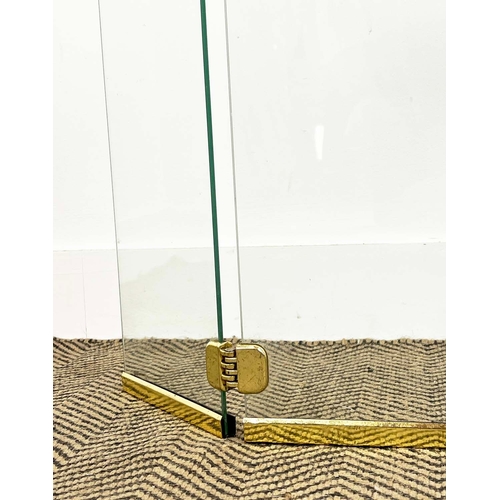 142 - FIRE SCREEN, in the manner of Jacques Adnet (1900-1984), glass and brass, 64cm H x 82cm W.