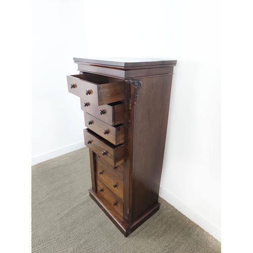 146 - WELLINGTON CHEST, Victorian rosewood containing seven drawers, 141cm H x 60cm W x 47cm D.