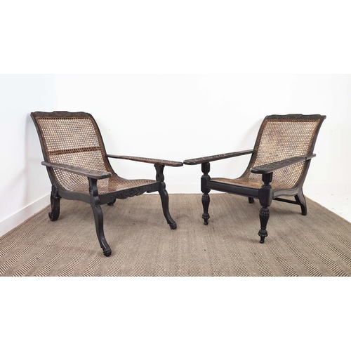 150 - PLANTERS CHAIRS, a near pair, 19th century Anglo-Indian ebony with cane seats and carved frames, 93c... 