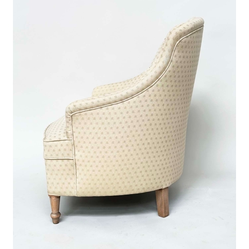 156 - SLIPPER ARMCHAIR, early 20th century with sand woven fabric upholstery, button back and tapering tur... 