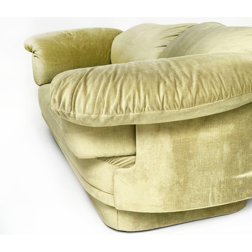 176 - HEALS SOFA, soft moss green velvet upholstered, with outswept cushion arms, 234cm W.