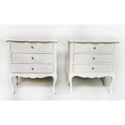 190 - BEDSIDE CHESTS, a pair, Italian grey painted of serpentine outline, each with three drawers, 62cm W ... 