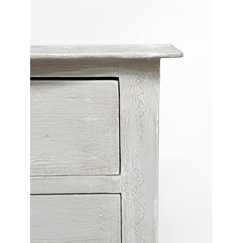 190 - BEDSIDE CHESTS, a pair, Italian grey painted of serpentine outline, each with three drawers, 62cm W ... 