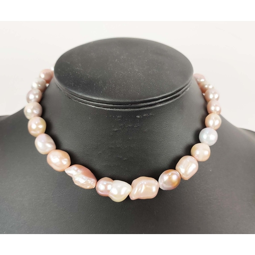 23 - A BAROQUE PEARL SINGLE STRAND NECKLACE, set with large AAA grade (approx.) high lustre Champagne pea... 