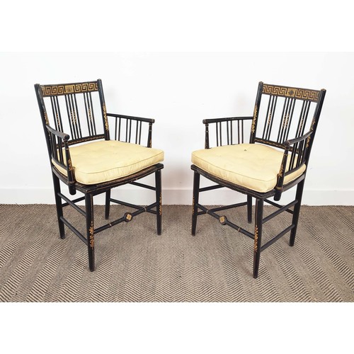 198 - ARMCHAIRS, a pair, Regency ebonised and painted with rush seats and silk squab cushions, 87cm H x 58... 