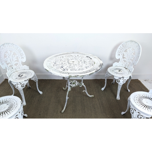 143 - GARDEN TABLE, white painted metal with circular top, 68cm H x 80cm D and a set of four chairs, 86cm ... 