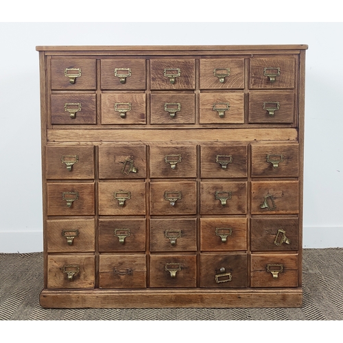 139 - EARLY 20TH CENTURY OAK AND PINE FILING CHEST, fitted with thirty drawers, 102cm H x 103cm x 52cm D.