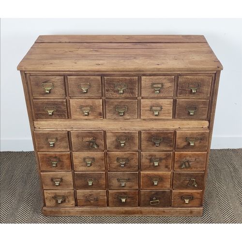 139 - EARLY 20TH CENTURY OAK AND PINE FILING CHEST, fitted with thirty drawers, 102cm H x 103cm x 52cm D.