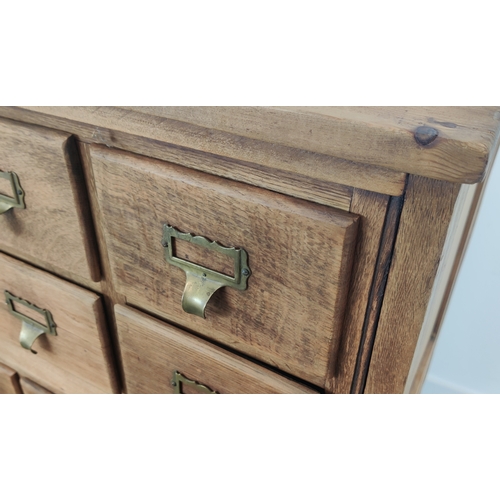 139 - EARLY 20TH CENTURY OAK AND PINE FILING CHEST, fitted with thirty drawers, 102cm H x 103cm x 52cm D.