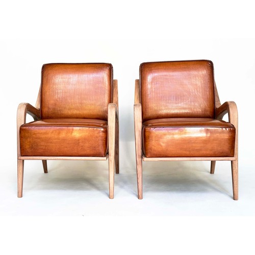 257 - ARMCHAIRS, a pair, 1960s Danish style, soft tan brown leather upholstery, 62cm W. (2)