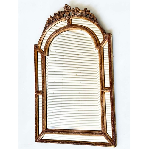 103 - WALL MIRROR, 19th century French giltwood and gesso moulded arched with marginal plates and foliate ... 