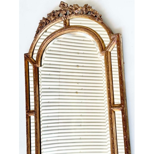 103 - WALL MIRROR, 19th century French giltwood and gesso moulded arched with marginal plates and foliate ... 