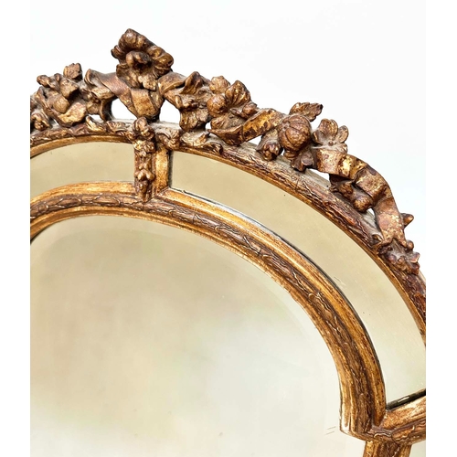 103 - WALL MIRROR, 19th century French giltwood and gesso moulded arched with marginal plates and foliate ... 