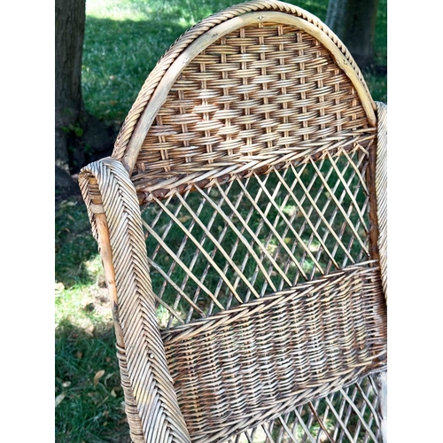 110 - CONSERVATORY ARMCHAIRS, comprising a 1930s vintage bamboo rattan and cane bound, retailed by 'Maple ... 