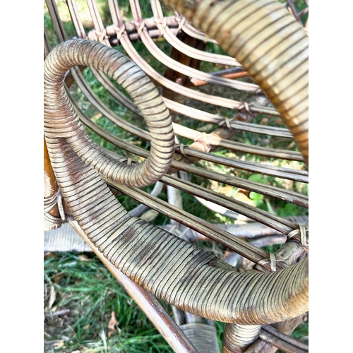 110 - CONSERVATORY ARMCHAIRS, comprising a 1930s vintage bamboo rattan and cane bound, retailed by 'Maple ... 