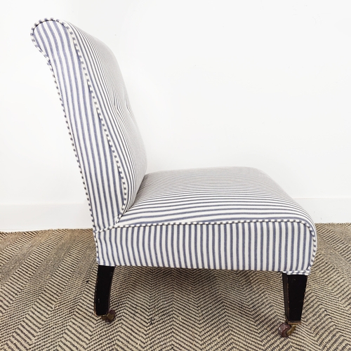 124 - SLIPPER CHAIR, Edwardian ebonised in new blue and white ticking on ceramic castors, 78cm H x 51cm W ... 