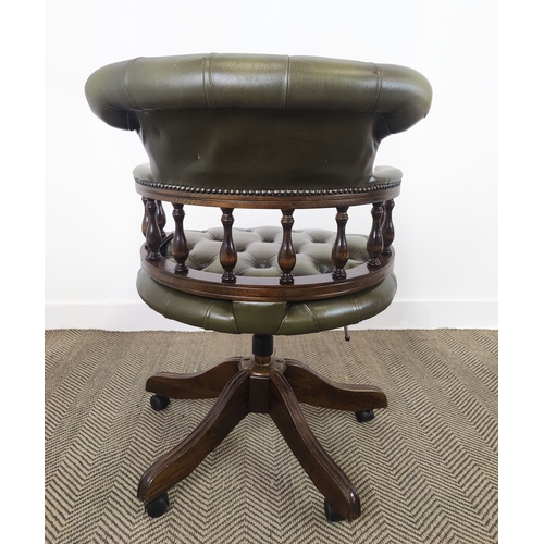 126 - DESK CHAIR, green leather with swivel seat on castors, 87cm H x 63cm W.