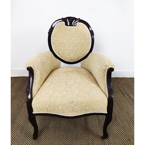 127 - ARMCHAIR, Edwardian mahogany, in patterned cream chenille on ceramic castors, 90cm H x 65cm W x 67cm... 