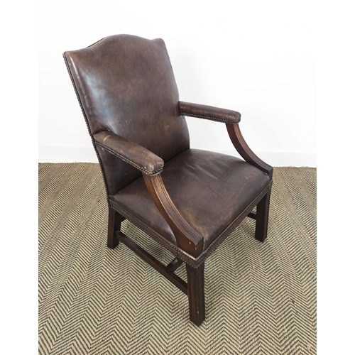 128 - GAINSBOROUGH STYLE ARMCHAIR, Georgian manner in brown leather, 100cm H x 60cm W x 67cm D.