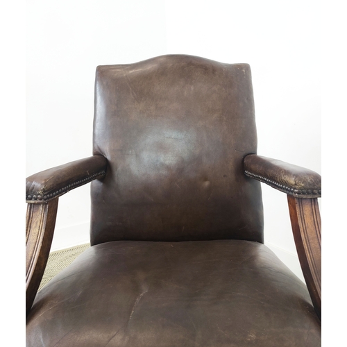 128 - GAINSBOROUGH STYLE ARMCHAIR, Georgian manner in brown leather, 100cm H x 60cm W x 67cm D.