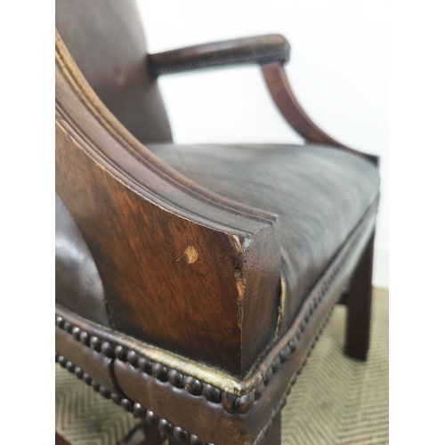 128 - GAINSBOROUGH STYLE ARMCHAIR, Georgian manner in brown leather, 100cm H x 60cm W x 67cm D.