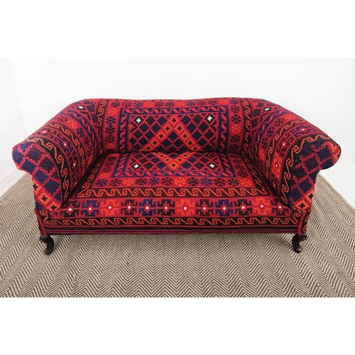 146 - CHESTERFIELD SOFA, late Victorian in red kilim upholstery, 79cm H x 174cm W x 83cm D.