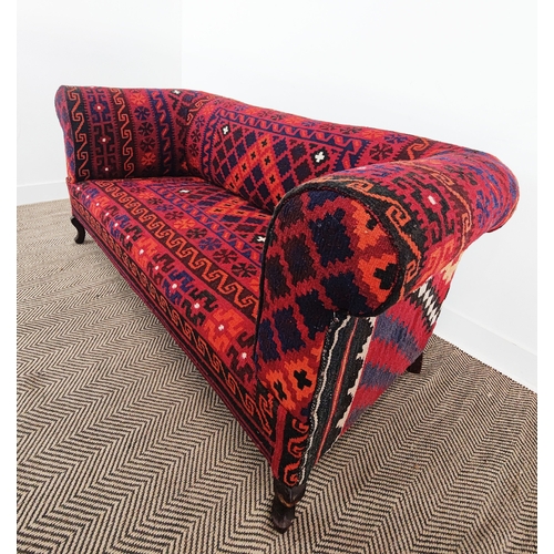 146 - CHESTERFIELD SOFA, late Victorian in red kilim upholstery, 79cm H x 174cm W x 83cm D.