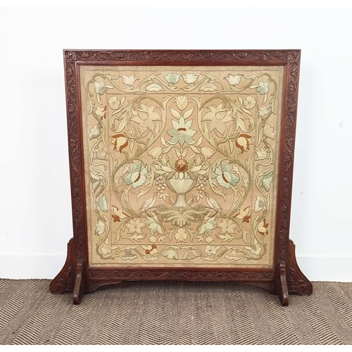 154 - FIRE SCREEN, William Morris manner embroidered panel housed in a carved oak frame, 100cm H x 110cm W... 