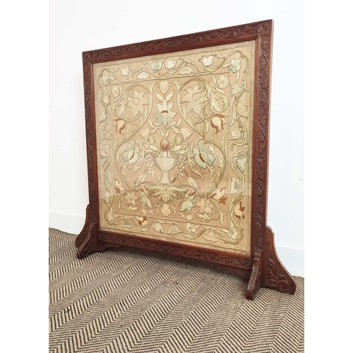 154 - FIRE SCREEN, William Morris manner embroidered panel housed in a carved oak frame, 100cm H x 110cm W... 