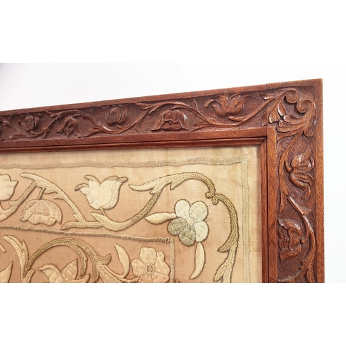 154 - FIRE SCREEN, William Morris manner embroidered panel housed in a carved oak frame, 100cm H x 110cm W... 