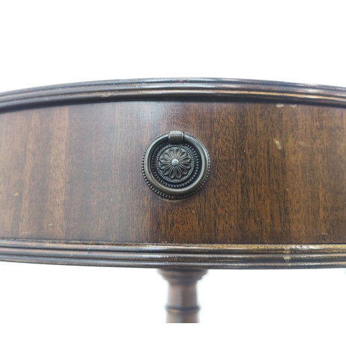 155 - DRUM TABLE, Regency design mahogany with tooled red leather top, 66cm H x 62cm x 62cm.