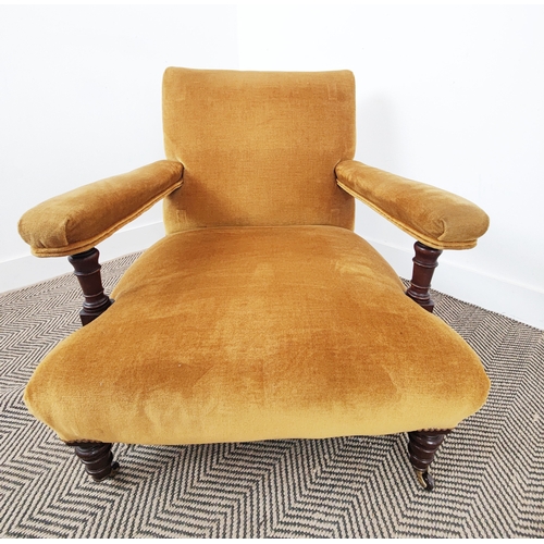 176 - HOWARD STYLE ARMCHAIR, Victorian design mahogany in gold velvet on castors, 72cm H x 73cm W x 88cm D... 