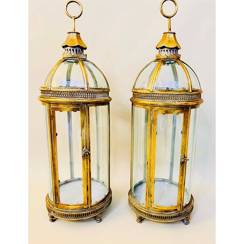 343 - LANTERNS, a pair, Regency style gilt metal and glass, 80cm H x 22cm W x 22cm D. (2)